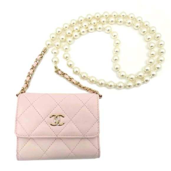 CHANEL Handbags - Chanel Mini Matelasse Pearl Chain Wallet